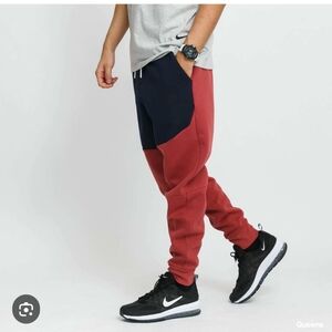 Nike Tech Fleece Tapered Leg Rust-Red Sweatshirt with Black Swoosh Tag